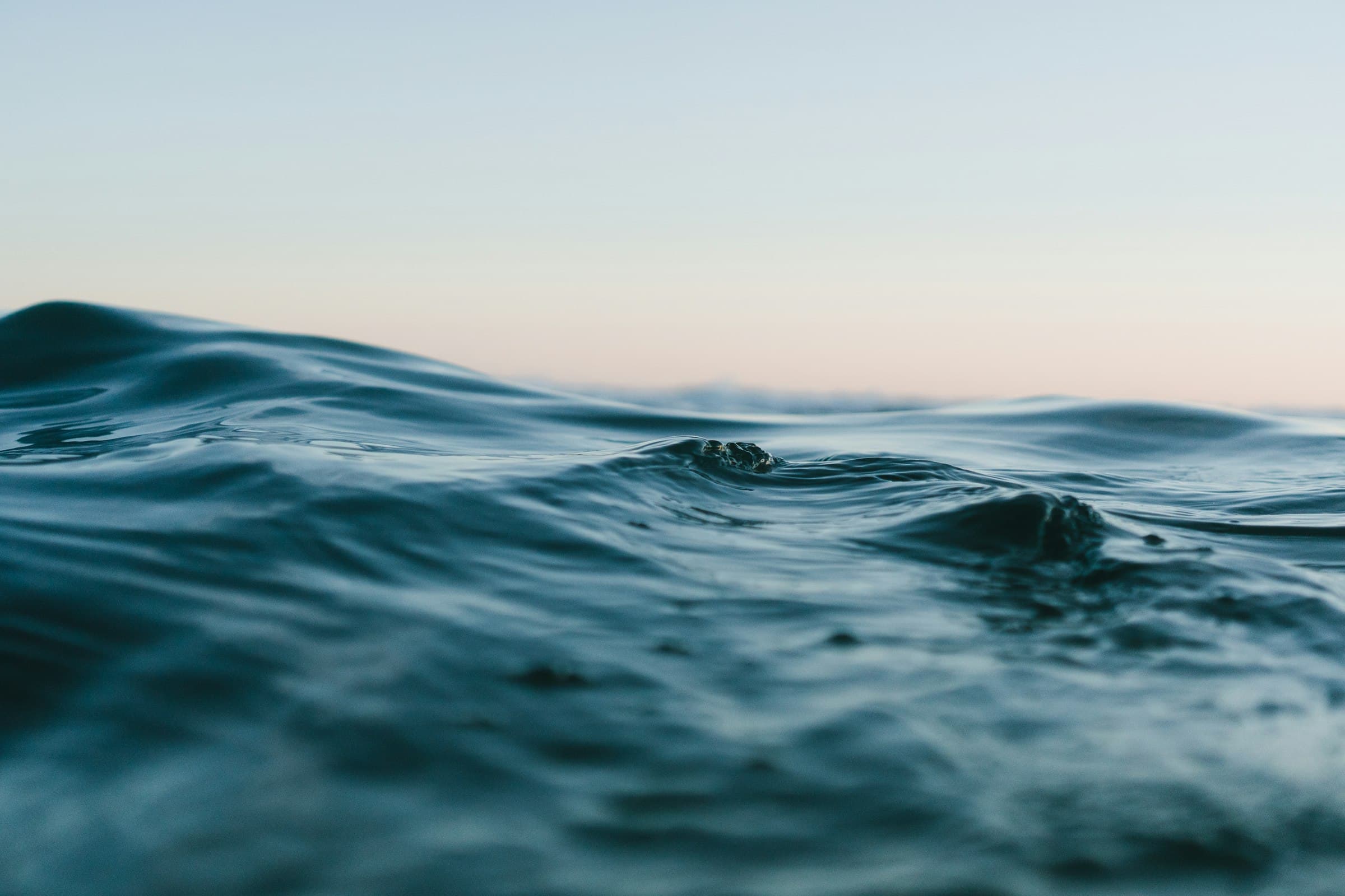 Dark ocean water rolling gently at the surface